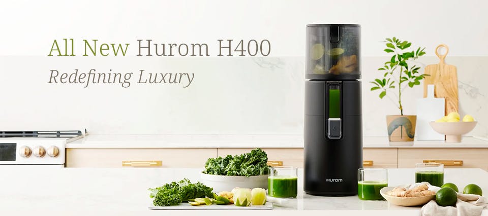 An image showing the H400 Cold Press Juicer with the caption "Redefining Luxury"